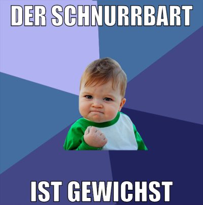 der schnurrbart ist gewichst