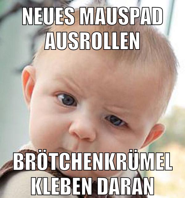 neues mauspad ausrollen brötchenkrümel kleben daran