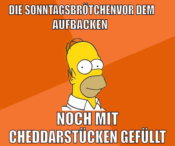 die sonntagsbrötchenvor dem                 aufbacken noch mit cheddarstücken gefüllt